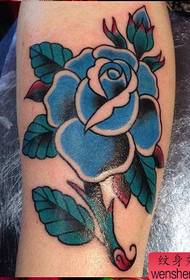 One leg colored rose tattoo pattern