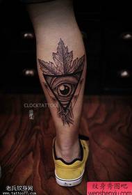 Obraz tatuażu liść klonu nogi bog oko