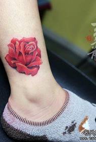 Beautiful red rose tattoo pattern on girls' legs