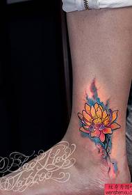 Iphethini le-ankle lotus tattoo