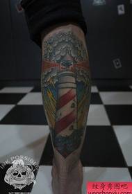 A popular lighthouse tattoo pattern for the legs