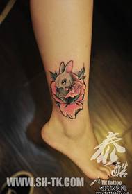 Girl legs cute bunny with rose tattoo pattern