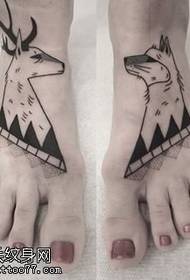 animal tattoo pattern on the foot