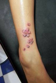 meisje benen kleuren kersenbloesem tatoeëringspatroon