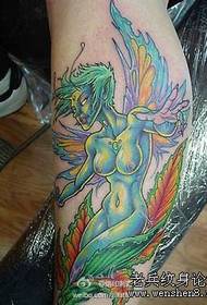 leg color elf wing tattoo