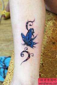 girl's leg nice butterfly tattoo pattern