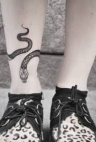 A set of foot ring tattoos around the ankle at the ankle