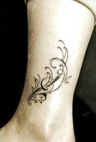 modèle de tatouage vigne fille jambe totem