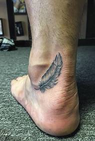 feather tattoo on the heel is simple and generous