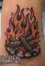 Torch tattoo pattern on the foot