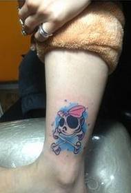 an attractive cartoon color skull tattoo picture on the ankle