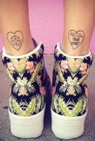 A pair of simple tattoos on the heel of the heel