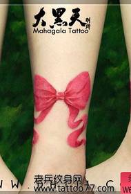 girl's leg nice bow tattoo pattern