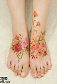 fresh floral tattoo pattern on the foot