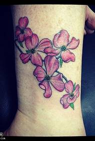 delicate floral tattoo pattern on the ankle