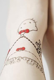woman's foot cartoon anklet tattoo