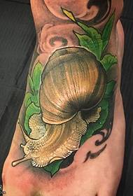 padrão de tatuagem de caracol no pé