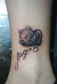 cute little bear squatting in the appearance of tattoos