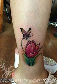 beautiful tulip butterfly tattoo pattern on the ankle