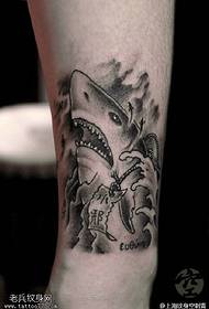 big shark tattoo pattern on the calf