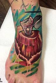 watering apple tattoo on the scorpion