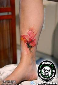 watercolor flower tattoo pattern on the ankle