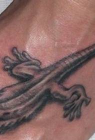 two lizard tattoo works on the instep