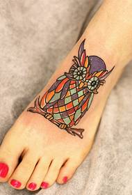 bella instep només bella foto de tatuatge de mussol de colors