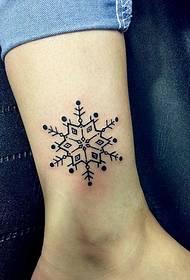 pretty small snowflake tattoo on the bare feet Qin