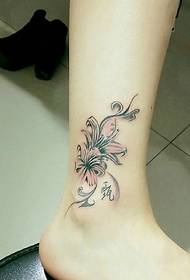 small fresh and beautiful flower tattoo pattern on the ankle