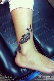 Woman's ankle feathers Yan tattoo tattoo works
