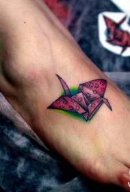 a red paper crane tattoo pattern