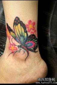 An ankle color butterfly tattoo pattern