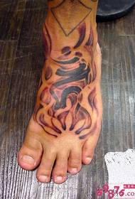 foot totem-tatoeëring van 'n voetfoto