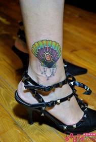 imagem de tatuagem de concha pequena bonita no tornozelo