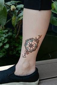 tatuatge de turmell brúixola de compàs de vinya flor creativa
