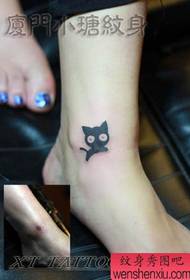 cute and stylish cat tattoo pattern on the girl's ankle