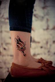 cute rabbit lollipop ankle tattoo picture