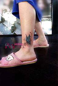 blue small butterfly ankle tattoo picture