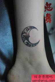 girl's ankle at the small popular moon tattoo pattern