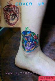 girl's ankle at the exquisitely popular hourglass tattoo pattern