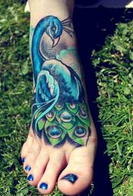 Beautiful peacock tattoo picture on the back