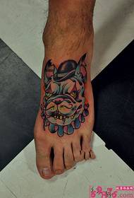 foot domineering dog head tattoo picture