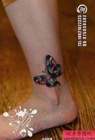 small and beautiful color butterfly tattoo pattern on the girl's ankle