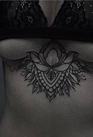 female sternum decorative style tattoo pattern
