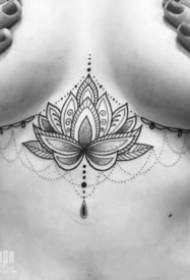 sexy chest tattoo between female breasts