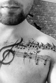црно-бели музички ноти на градите персонализирана шема на тетоважи