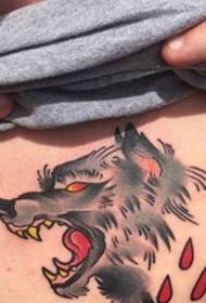 a fierce open-faced wolf tattoo picture on the man's chest