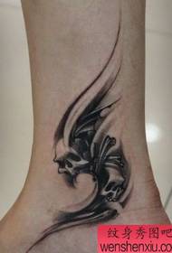 Beauty foot skull vine tattoo