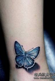 vrouwen tattoo patroon: schoonheid been kleur vlinder tattoo patroon foto
